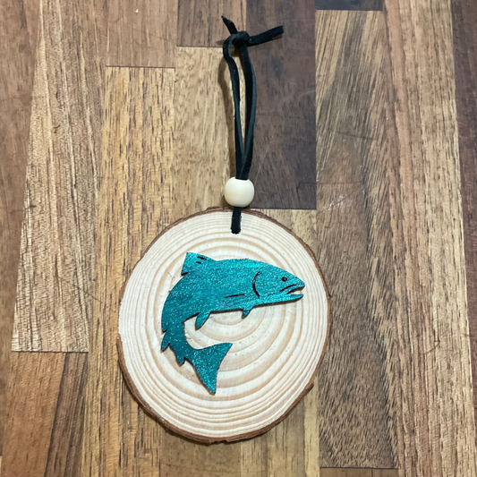 Wooden ornament with teal blue fish design on a wooden round with wood bead tied on a black leather string.